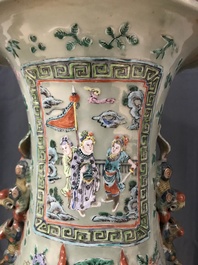 A pair of large Chinese famille verte celadon-ground vases with figural design, 19th C.