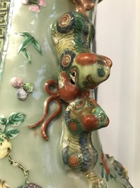 A pair of large Chinese famille verte celadon-ground vases with figural design, 19th C.