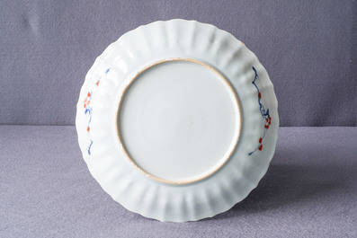 A Chinese famille verte 'Provinces' dish with the arms of England, Kangxi/Yongzheng