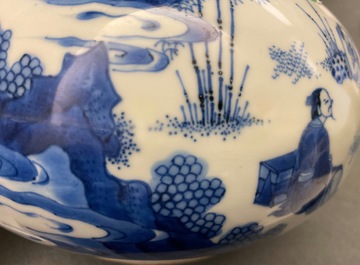 A Chinese blue and white bottle vase with figures in a landscape, Transitional period
