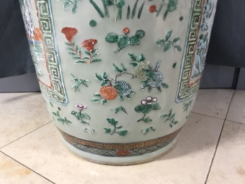 A pair of large Chinese famille verte celadon-ground vases with figural design, 19th C.