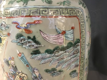 A pair of large Chinese famille verte celadon-ground vases with figural design, 19th C.