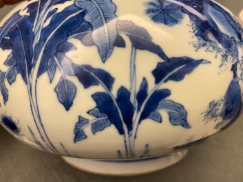 A Chinese blue and white bottle vase with figures in a landscape, Transitional period