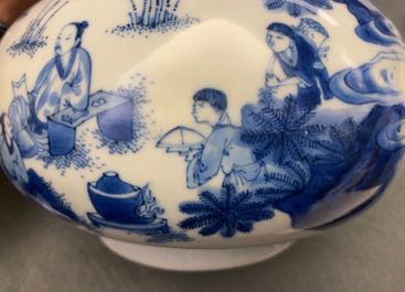 A Chinese blue and white bottle vase with figures in a landscape, Transitional period