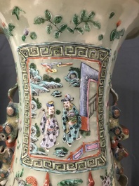A pair of large Chinese famille verte celadon-ground vases with figural design, 19th C.