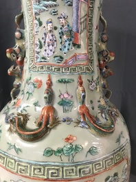 A pair of large Chinese famille verte celadon-ground vases with figural design, 19th C.