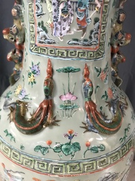 A pair of large Chinese famille verte celadon-ground vases with figural design, 19th C.