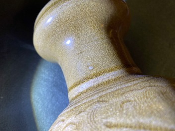 A Chinese brown-glazed vase and cover with incised design, Song