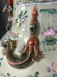 A pair of large Chinese famille verte celadon-ground vases with figural design, 19th C.