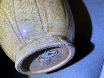 A Chinese brown-glazed vase and cover with incised design, Song