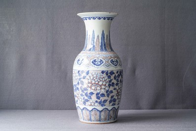 A Chinese blue, white and underglaze red vase, 19th C.
