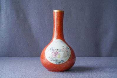 A Chinese famille rose coral-ground vase, Qianlong mark, 19/20th C.