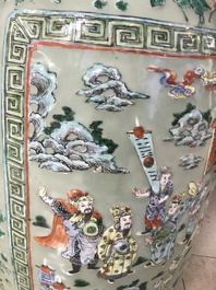 A pair of large Chinese famille verte celadon-ground vases with figural design, 19th C.