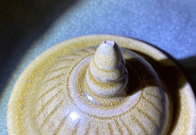 A Chinese brown-glazed vase and cover with incised design, Song