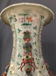 A pair of large Chinese famille verte celadon-ground vases with figural design, 19th C.