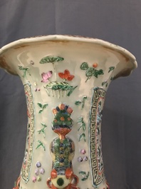 A pair of large Chinese famille verte celadon-ground vases with figural design, 19th C.