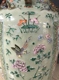 A pair of large Chinese famille verte celadon-ground vases with figural design, 19th C.