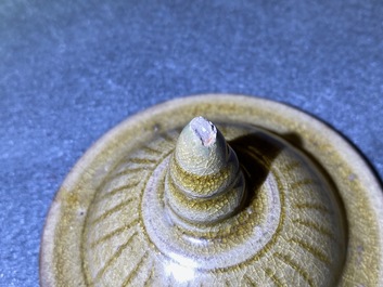 A Chinese brown-glazed vase and cover with incised design, Song