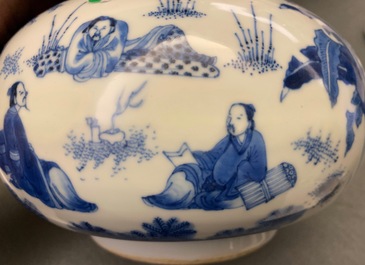 A Chinese blue and white bottle vase with figures in a landscape, Transitional period