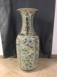 A pair of large Chinese famille verte celadon-ground vases with figural design, 19th C.