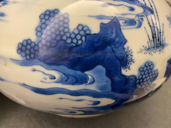 A Chinese blue and white bottle vase with figures in a landscape, Transitional period