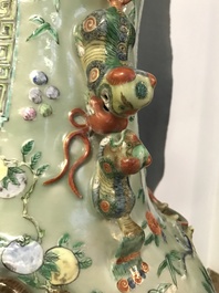 A pair of large Chinese famille verte celadon-ground vases with figural design, 19th C.