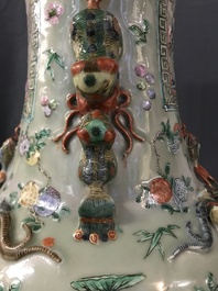 A pair of large Chinese famille verte celadon-ground vases with figural design, 19th C.
