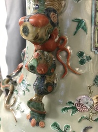 A pair of large Chinese famille verte celadon-ground vases with figural design, 19th C.