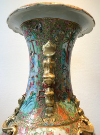 A pair of large Chinese Canton famille rose vases, 19th C.