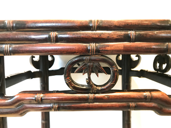 A Chinese huali wooden stand with famille rose plaque, Jiaqing
