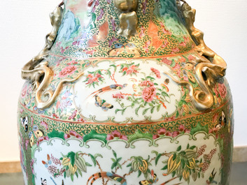 A pair of large Chinese Canton famille rose vases, 19th C.