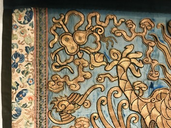 A Chinese gold-thread embroidered silk dragon wall tapestry, 19th C.
