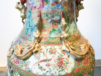 A pair of large Chinese Canton famille rose vases, 19th C.