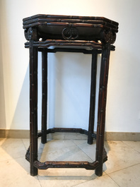 A Chinese huali wooden stand with famille rose plaque, Jiaqing