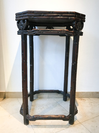 A Chinese huali wooden stand with famille rose plaque, Jiaqing