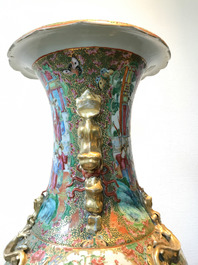 A pair of large Chinese Canton famille rose vases, 19th C.