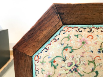 A Chinese huali wooden stand with famille rose plaque, Jiaqing