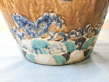 A large Chinese polychrome stoneware martaban jar and cover, Ming/Qing
