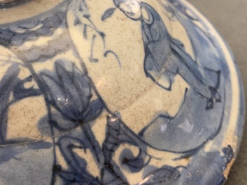 A Chinese blue and white vase and cover with figural design, Wanli