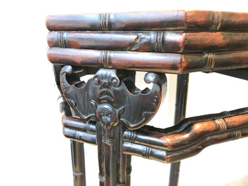 A Chinese huali wooden stand with famille rose plaque, Jiaqing