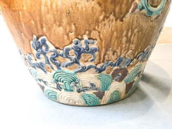 A large Chinese polychrome stoneware martaban jar and cover, Ming/Qing