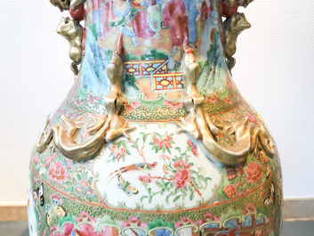 A pair of large Chinese Canton famille rose vases, 19th C.
