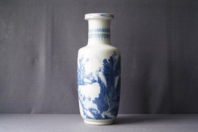 A Chinese blue and white rouleau vase with figures in a landscape, Kangxi