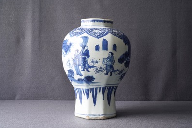 A Chinese blue and white baluster vase with figures in a landscape, Transitional period