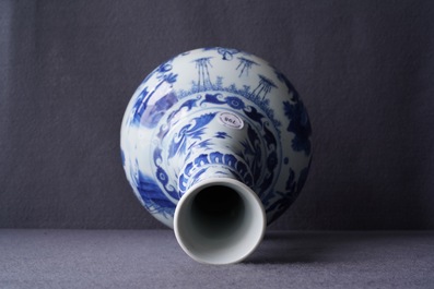A Chinese blue and white bottle vase with figures in a landscape, Transitional period