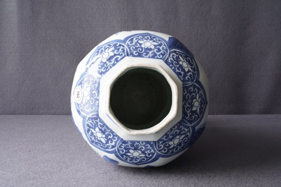A Chinese blue and white baluster vase with figures in a landscape, Transitional period
