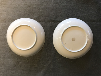A pair of fine Chinese famille rose 'European subject' cups and saucers, Qianlong