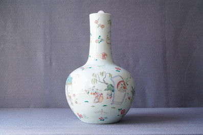 A Chinese famille rose vase with figurative medallions, Qianlong mark, 19th C.