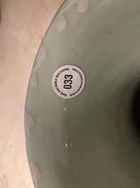 A Chinese brown- and celadon-ground famille rose vase, 19th C.