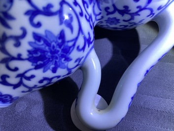 A Chinese blue and white 'bats and shou' jug, 19th C.
